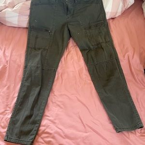 Green multi zipper pants